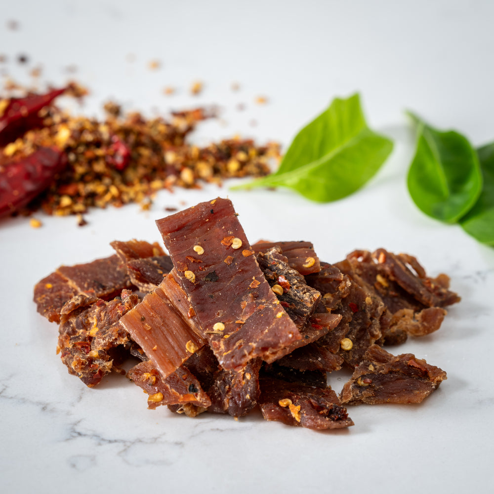 Mallorys Jerky Peri Peri Pork Jerky 100g Zesty Spicy Snack (for Human Consumption)